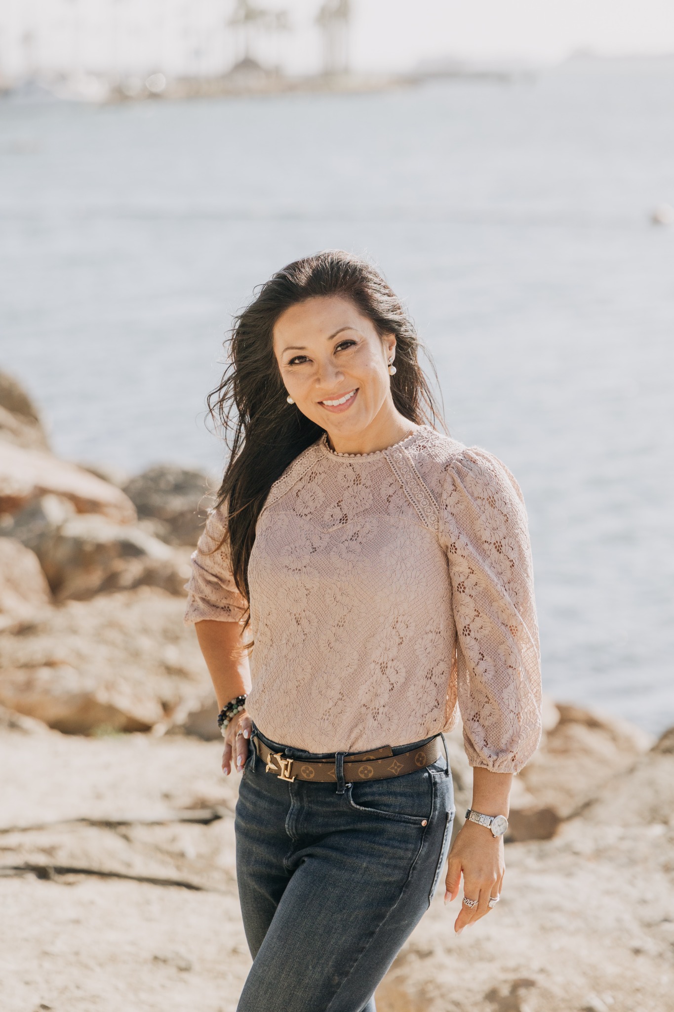 Jennifer Ebilane smiling by the water